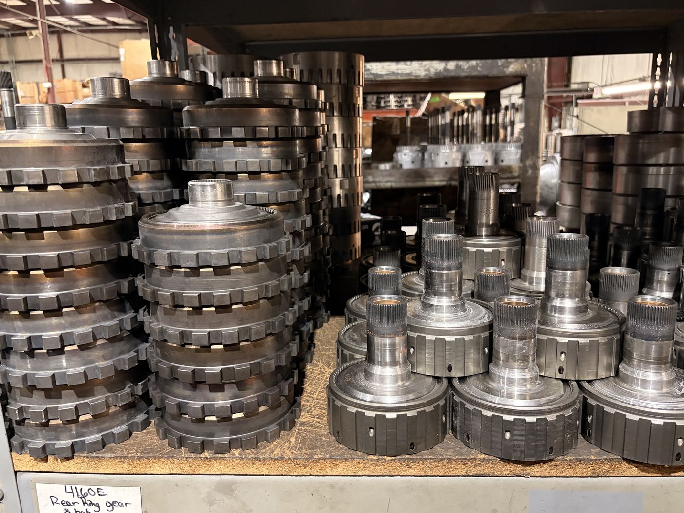 Shelves of transmission hard parts at Teal Automotive